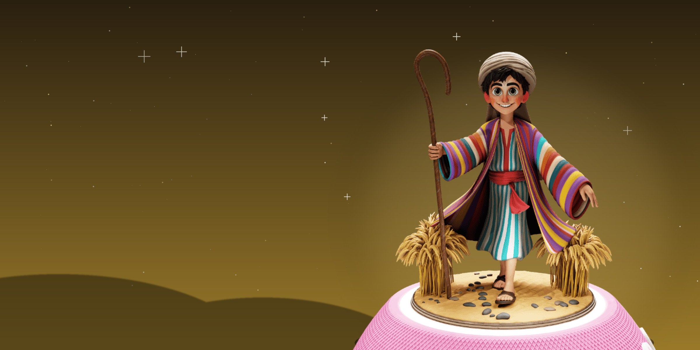 Figurine Yossef (Joseph) avec sa tunique multicolore et ses gerbes de blé, posée sur l’enceinte Jew’Box devant des dunes dorées